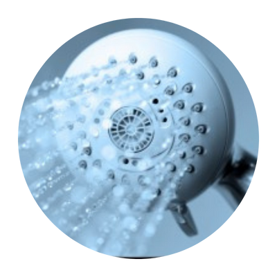 Up close of water coming out of a shower head. 